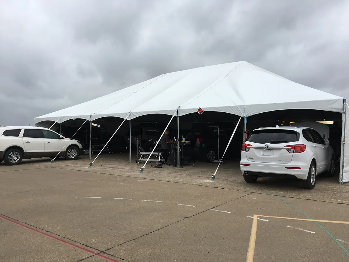 Mobile hail repair tent setup