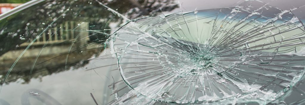 Close-up of broken windshield. 